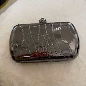 Zara Metallic Silver Textured Clutch